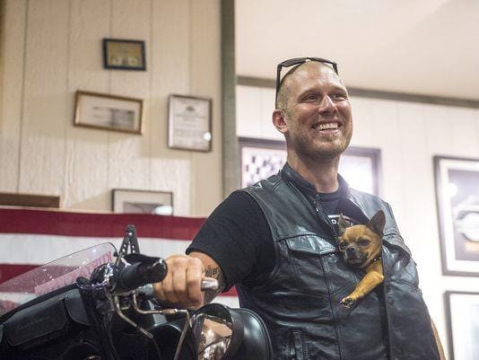 Scootin Across The Country on a Motorcycle with a Chihuahua.