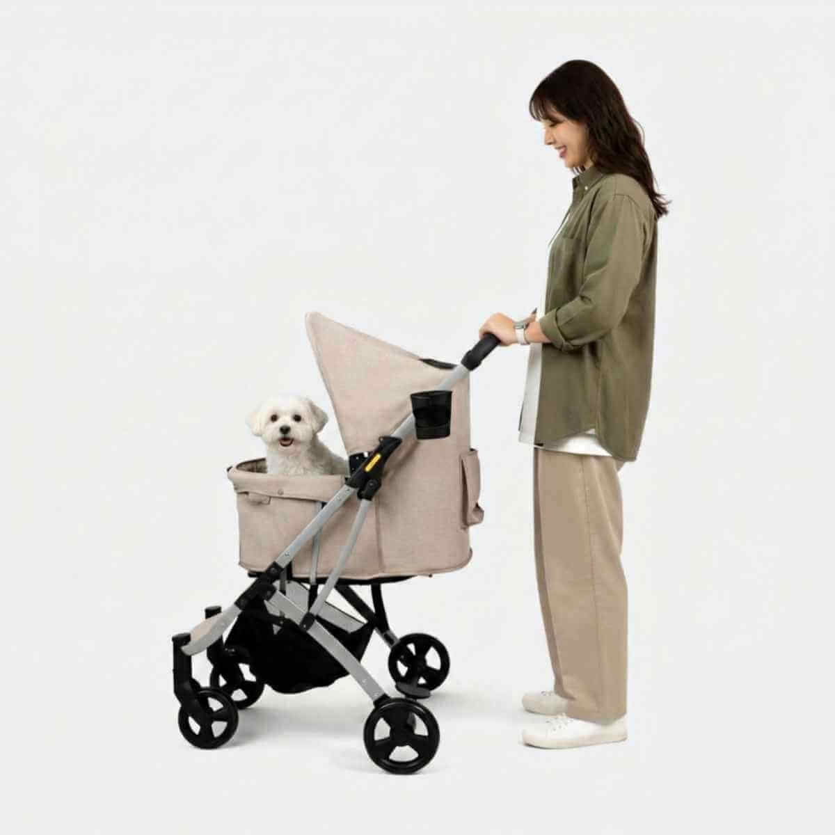 Side profile of the grey Ibiyaya Evolution Speedy Fold travel buggy for dogs