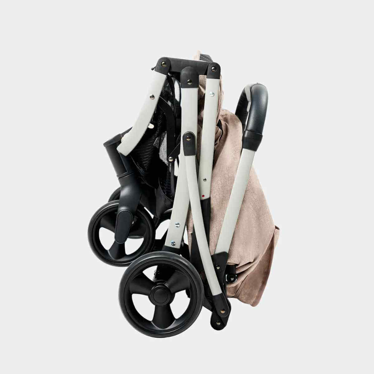 Compact folded Ibiyaya Evolution Speedy Fold Pet Stroller resting flat on the ground