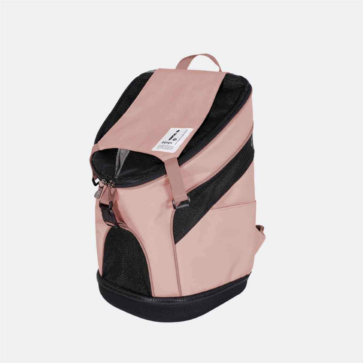 3/4 of Coral Pink Ibiyaya Ultralight Pro backpack carrier for small dogs.